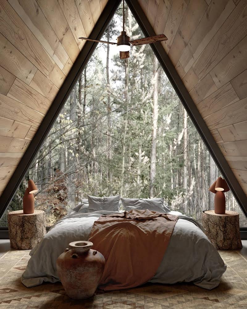 cabin bedroom with forest view